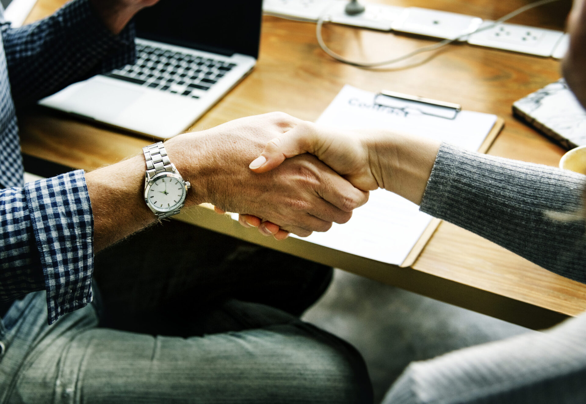 Business people shaking hands in agreement